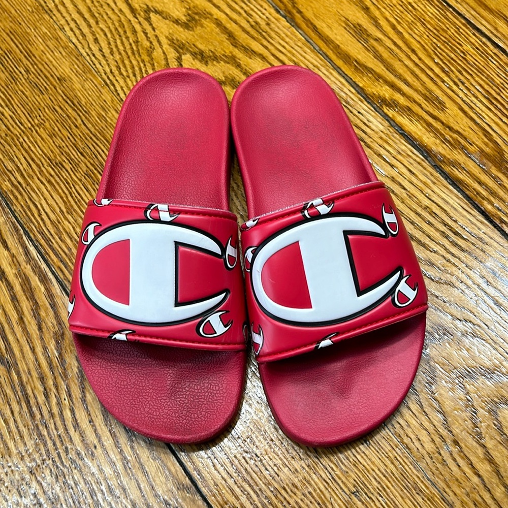 Champion red slides with brand logo.  Youth Size 4.
